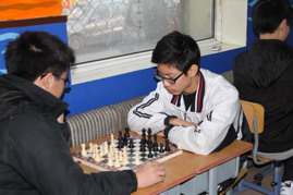 我校三棋代表队喜获佳绩